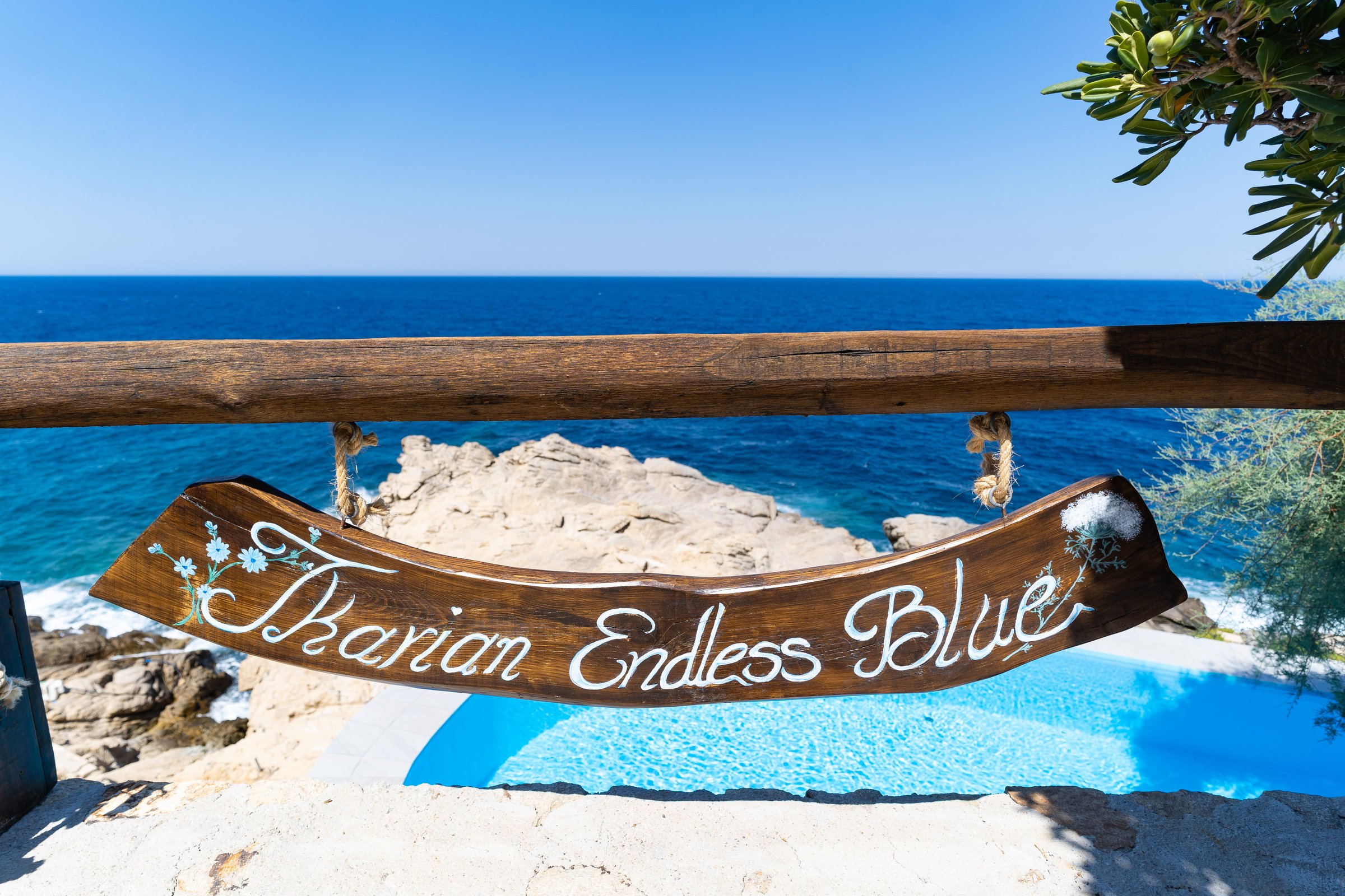 Entrance of the Traditional Ikarian Edition House with the Ikarian Endless Blue sign and pool